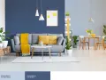 Nowoczesny salon z sofą i stolikiem kawowym. Ściana podzielona na dwa odcienie niebieskiego, nazwy P35 Zjawiskowa i P36 Wybitna.