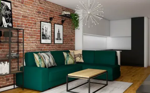 Nowoczesny salon z cegłą i drewnem. Zielona kanapa, stolik kawowy i grafiki z polskimi miastami tworzą przytulną przestrzeń.