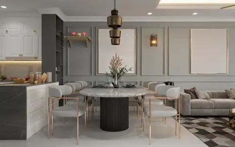 Elegancka kuchnia z jadalnią, gdzie marmurowy stół otoczony jest nowoczesnymi krzesłami. W tle widać kanapę i stylowe oświetlenie.