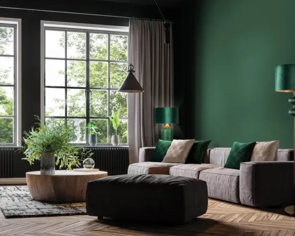 Męski pokój inspiracje: elegancka zieleń, drewno i komfortowa sofa. Idealne miejsce na relaks i pracę.